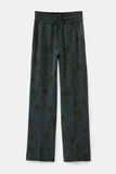 Floral trousers open at hem